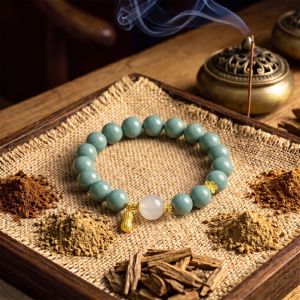 0a2d6572-104f-4819-8ce3-9b78c753dbf2.jpg Teal Meditation Bracelet - Handcrafted Mala with Peanut Pendant