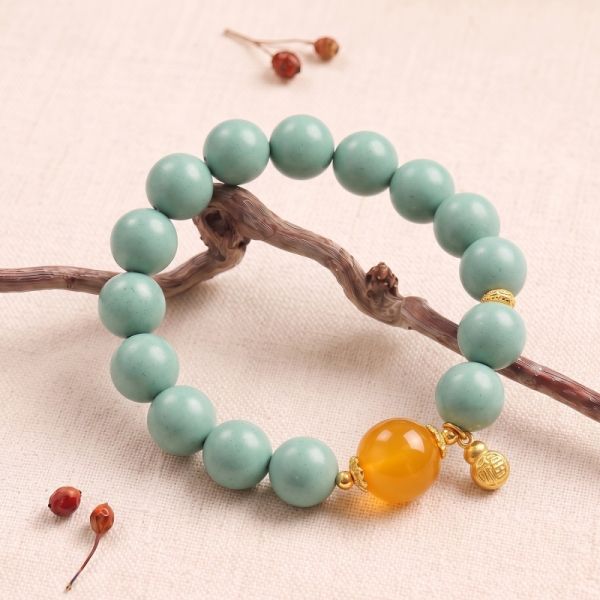 0c0058ce-5c9c-4f20-8db7-b245b8018516.jpg Turquoise & Gold Bead Bracelet - Handmade Mala with Filigree Charm