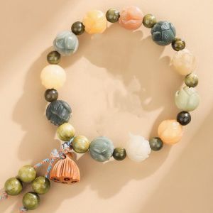 10c71d44-89c7-4ace-874d-e61376f05f01.jpg Lotus Carved Bead Bracelet - Turtle Motif Accent, Wooden Lotus Charm