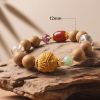 19c17d61-7546-4d1f-b36e-302b3928410b.jpg Mixed Bead Mala Bracelet - Handcrafted with Carved Charm & Gold-Tone Spacers