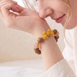 2805bb42-c82d-4ae8-82d7-7c8cdaf3be7b.jpg Peach Wooden Bead Bracelet - Handcrafted Bracelet with Ribbon Bow