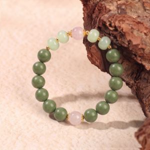 53a4d25d-f6e1-4480-9412-87f82fab2def.jpg reen Bead Mala Bracelet - Handmade Purple Accent Beads, Mindfulness Jewelry