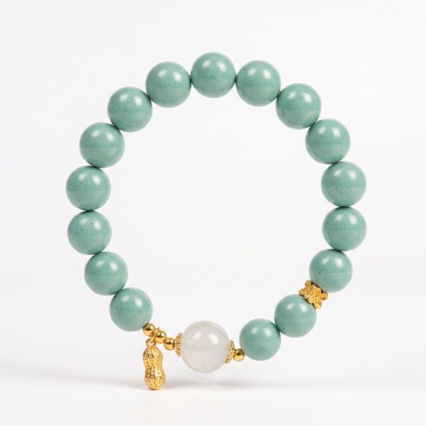 9d4434b3-f351-4739-9745-f0ea9085c661-1.jpg Teal Meditation Bracelet - Handcrafted Mala with Peanut Pendant