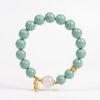 9d4434b3-f351-4739-9745-f0ea9085c661.jpg Teal Meditation Bracelet - Handcrafted Mala with Peanut Pendant