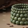 e693f0bd-240c-4c9e-93d0-2b6dc6a9b058.jpg Green Round Bead Mala - Handcrafted Chinese Lucky Bracelet