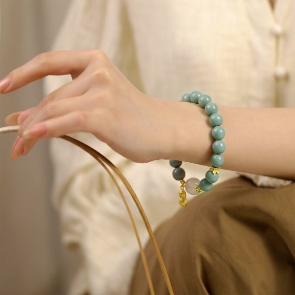 fdf97095-18c4-41a2-abbd-b0b9c9892230.jpg Teal Meditation Bracelet - Handcrafted Mala with Peanut Pendant